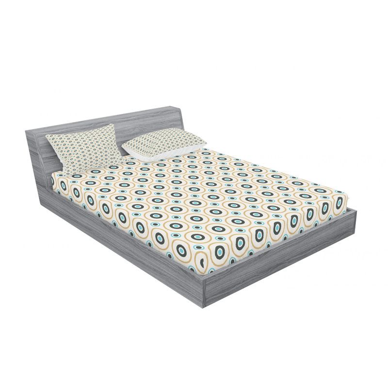 Ensemble de draps géométriques à motif de cercles et de pois de différentes tailles