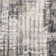 Mackensy Abstract Gray Power-Loom Area Rug