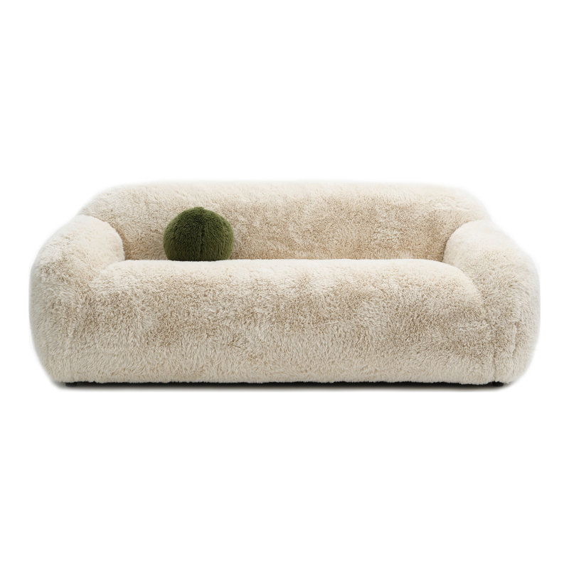 Canapé Harry en fausse fourrure avec coussin boule, Beige